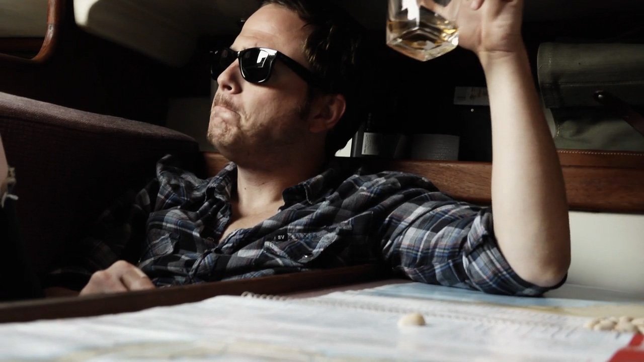 Blaise drinking on the boat